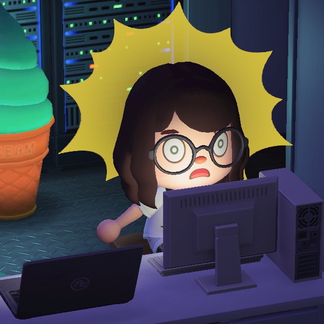 Alli's Animal Crossing: New Horizons character is in front of a computer and a laptop, with a dumbfounded expression.